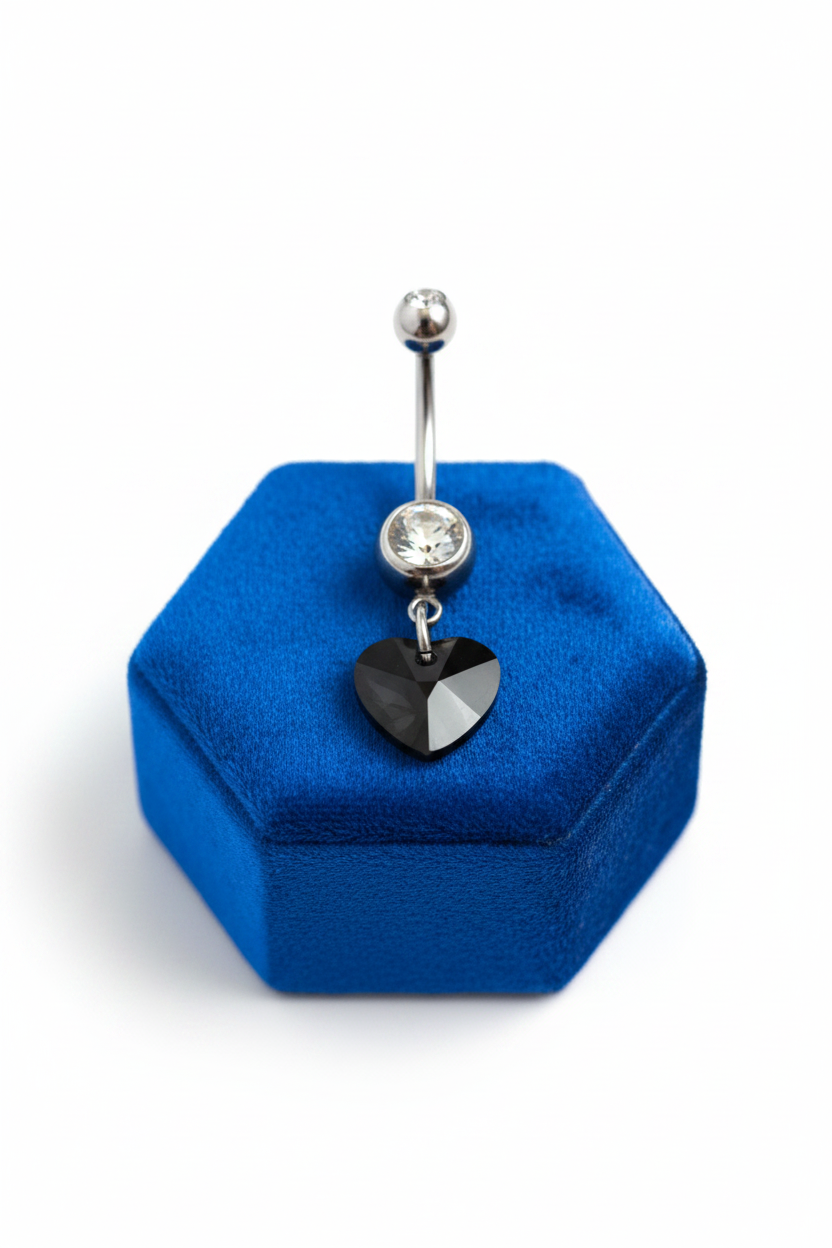 Black Crystal Heart Belly Button Ring in 316l stainless steel on a blue velvet jewelry display.