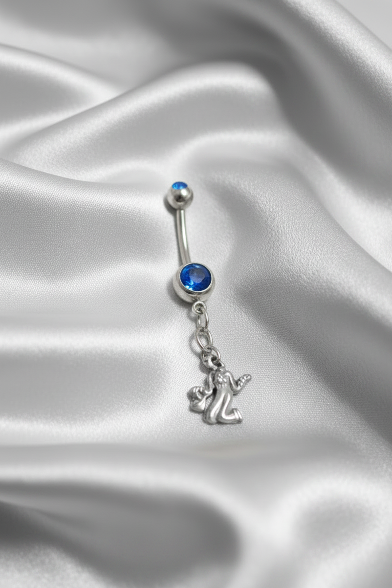 Blue Crystal Virgo Belly Button Ring in 316l stainless steel.