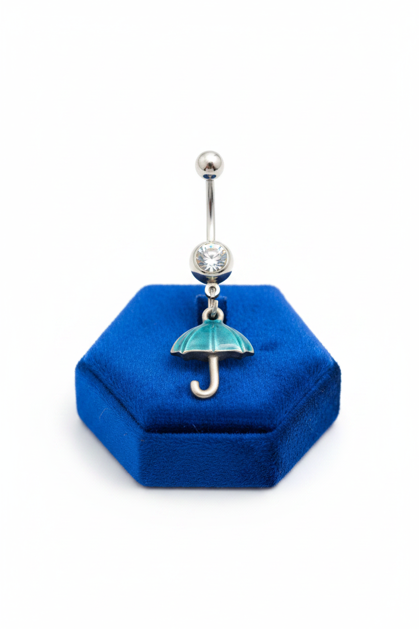 Clear Crystal Aqua Umbrella Belly Button Ring in 316l stainless steel on a blue velvet jewelry display.