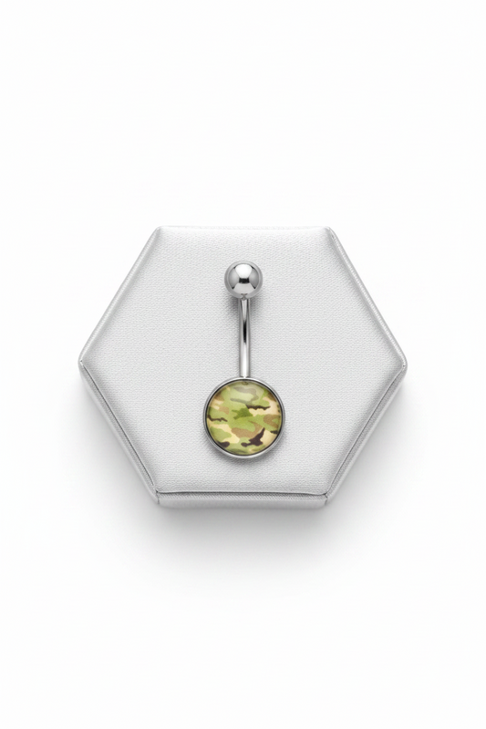 Green Camouflage Belly Button Ring in 316l stainless steel on a silver silk jewelry display.