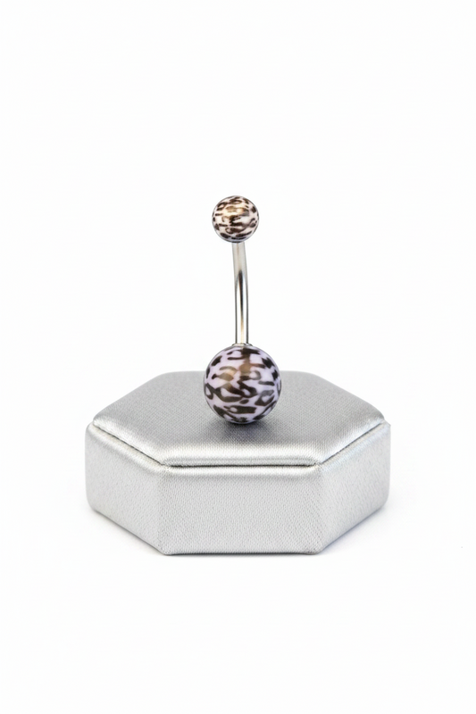 Blue Leopard Print Acrylic Belly Button Ring in 316l stainless steel on a silver jewelry display.