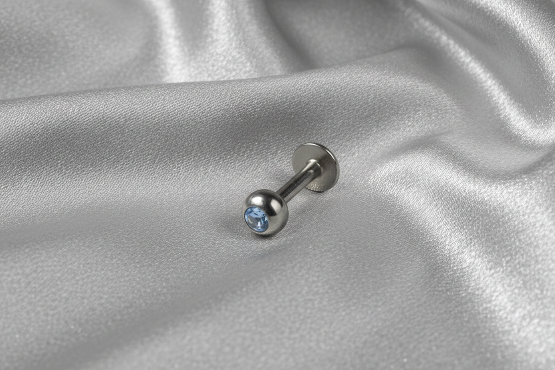 Sky Blue Crystal Labret Lip Ring in 316l stainless steel.