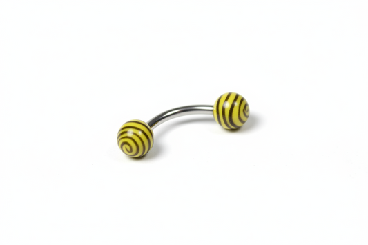Yellow and Black Tiger Striped Acrylic Eyebrow Ring in 316l stainless steel close up detail.