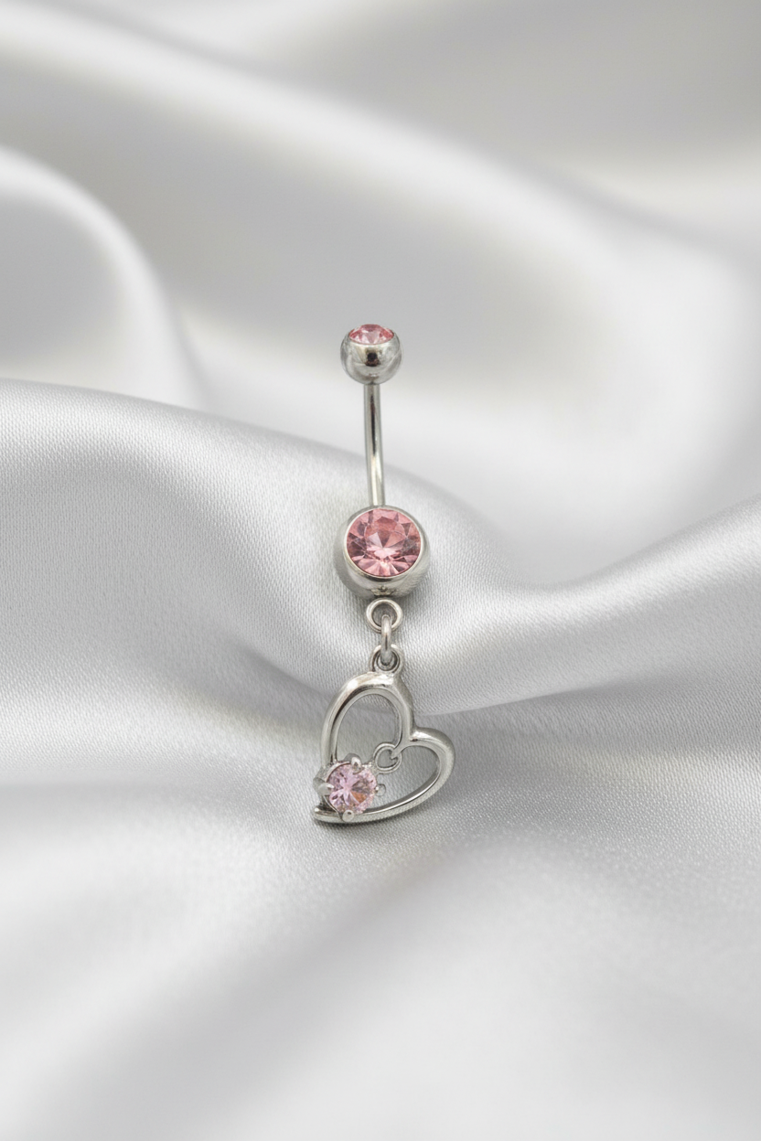Pink Crystal Heart Belly Button Ring in 316l stainless steel.