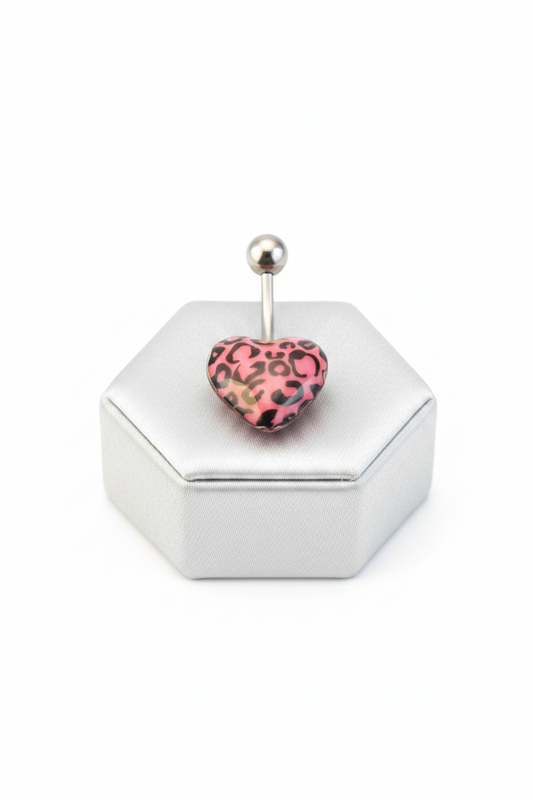 Pink Leopard Print Heart Acrylic Belly Button Ring in 316l stainless steel on a silver silk jewelry display.