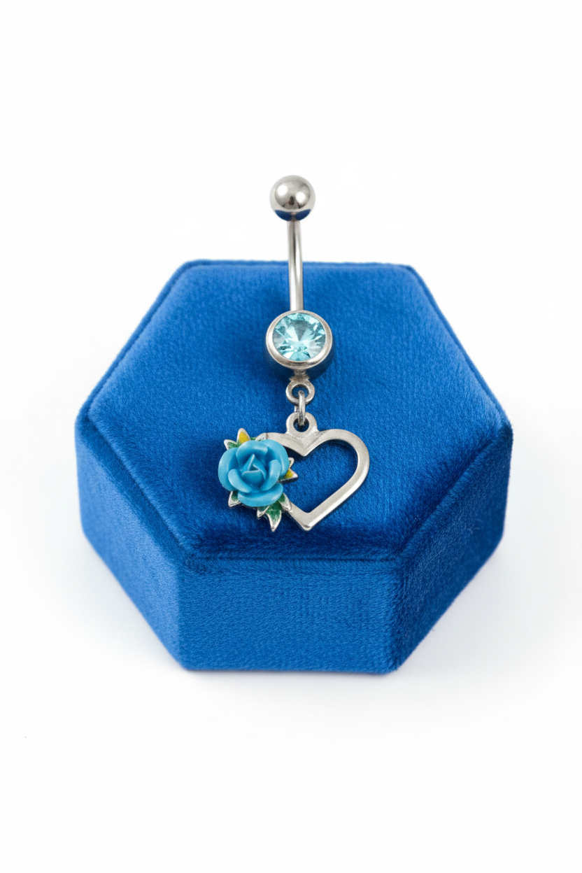 Aqua Crystal Rose Heart Belly Button Ring in 316l stainless steel on a blue velvet jewelry display.