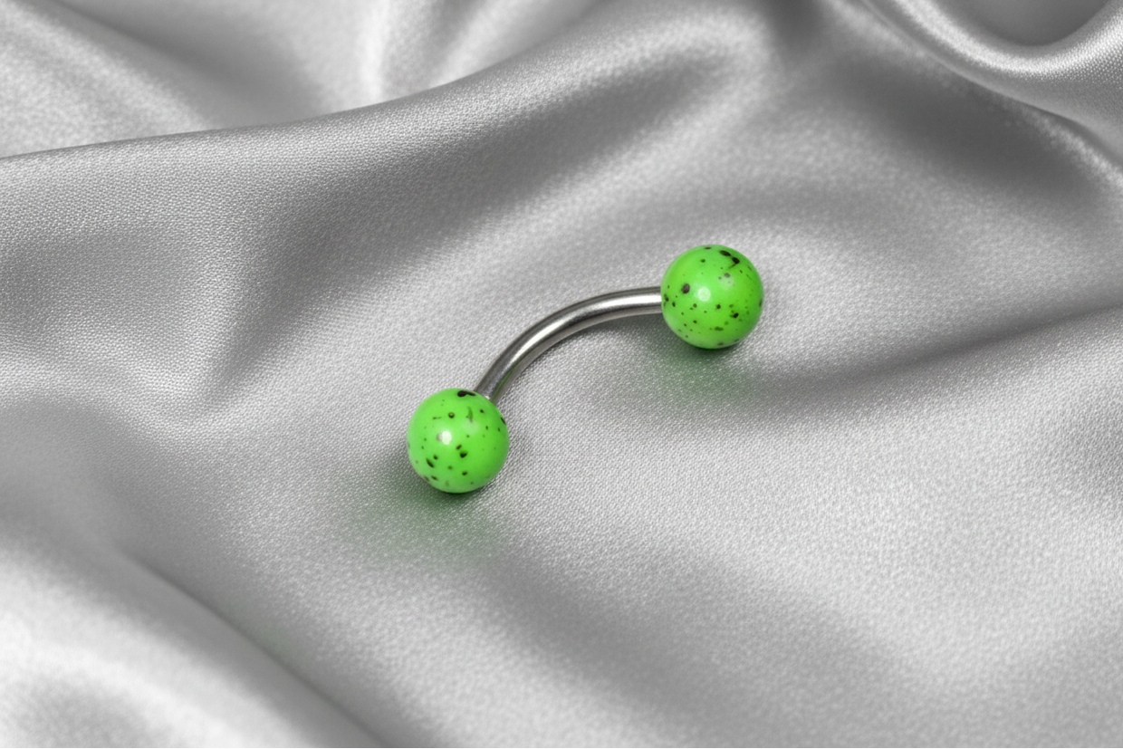 Green Black Speckled Acrylic Eyebrow Ring in 316l stainless steel.