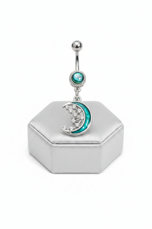 Abalone Moon Belly Button Ring in 316l stainless steel on a silver silk jewelry display.