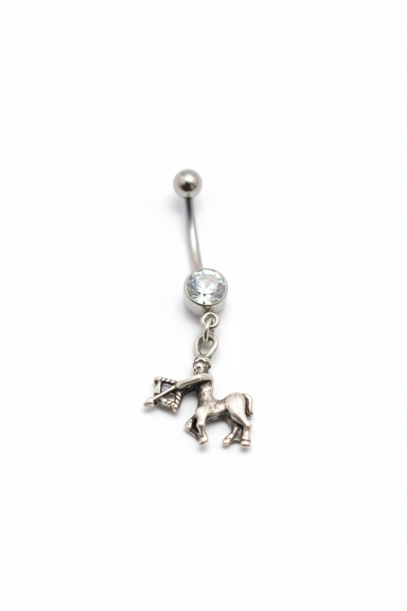 Clear Crystal Sagittarius Belly Button Ring in 316l stainless steel close up detail.