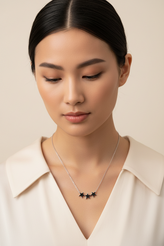 3 Stars Steel Chain Necklace in 316l stainless steel on a female model.