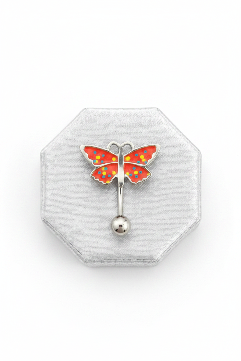 Red Butterfly Upside Down Belly Button Ring in 316l stainless steel on a silver jewelry display.
