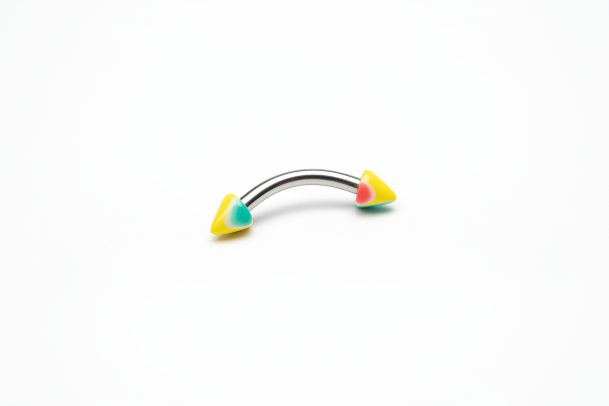 Multicolor Acrylic Spike Eyebrow Ring in 316l stainless steel close up detail.