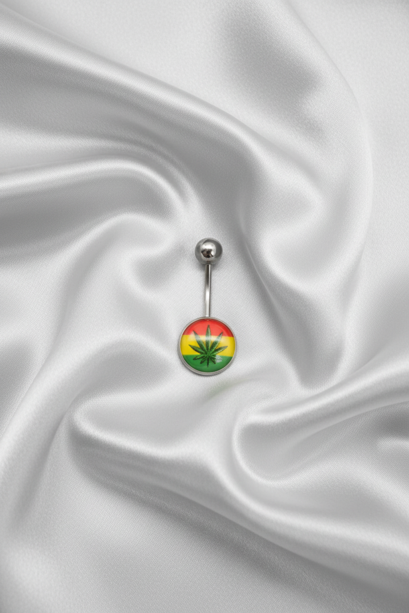 Green Leaf Rastafarian Belly Button Ring in 316l stainless steel on silver silk fabric.