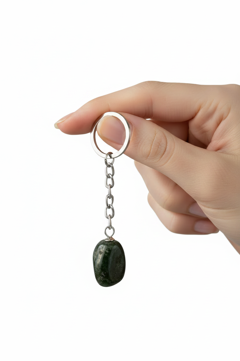 Black Agate Natural Earth Stone Handmade Steel Plated Keychain held by a hand showing scale.