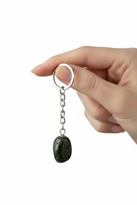Black Agate Natural Earth Stone Handmade Steel Plated Keychain held by a hand showing scale.