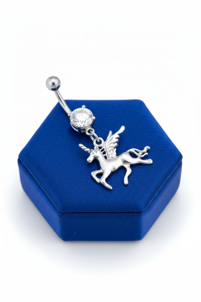 Clear Crystal Pegasus Unicorn Belly Button Ring in 316l stainless steel on a blue silk jewelry display.