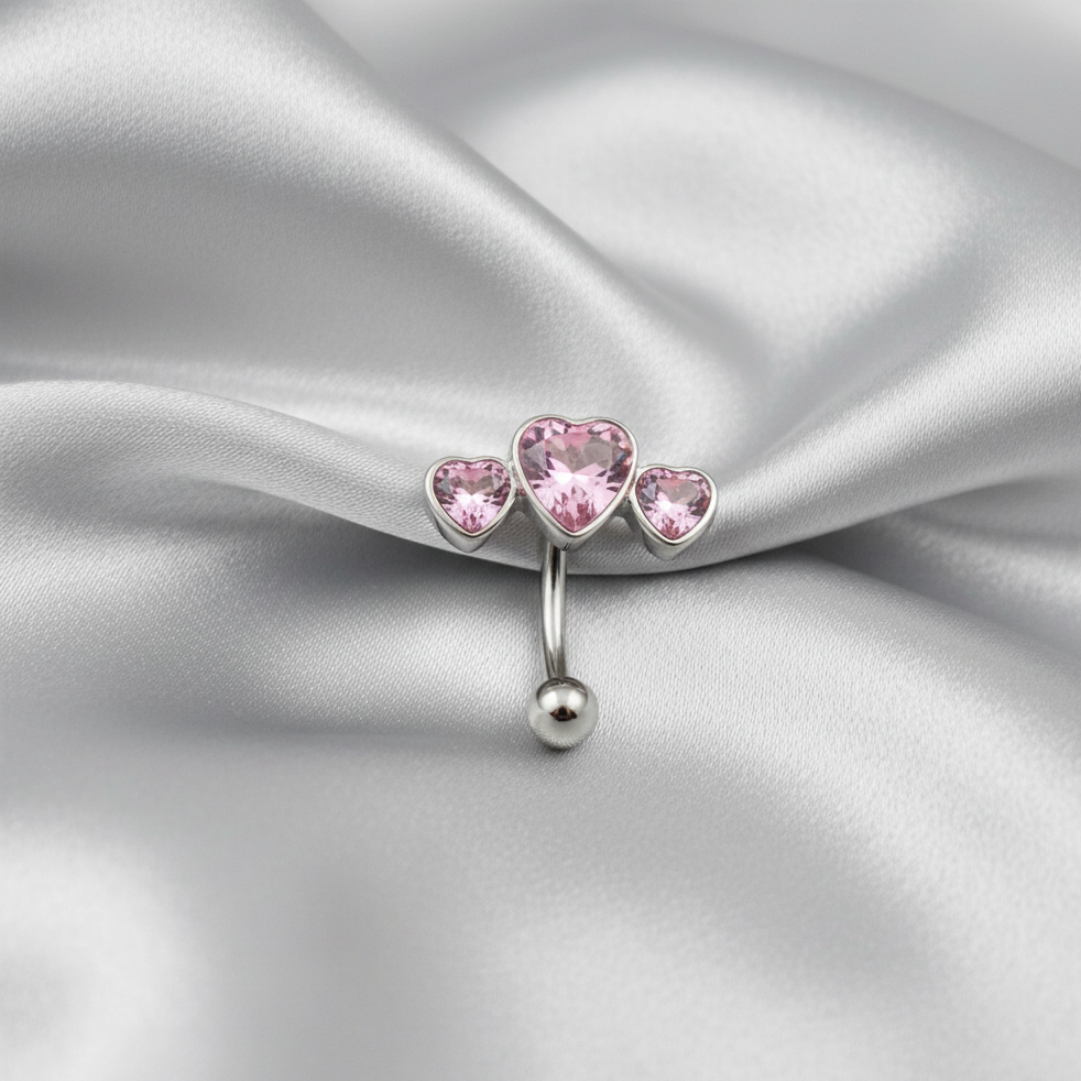 Pink Crystal Triple Heart Eyebrow Ring in 316l stainless steel.
