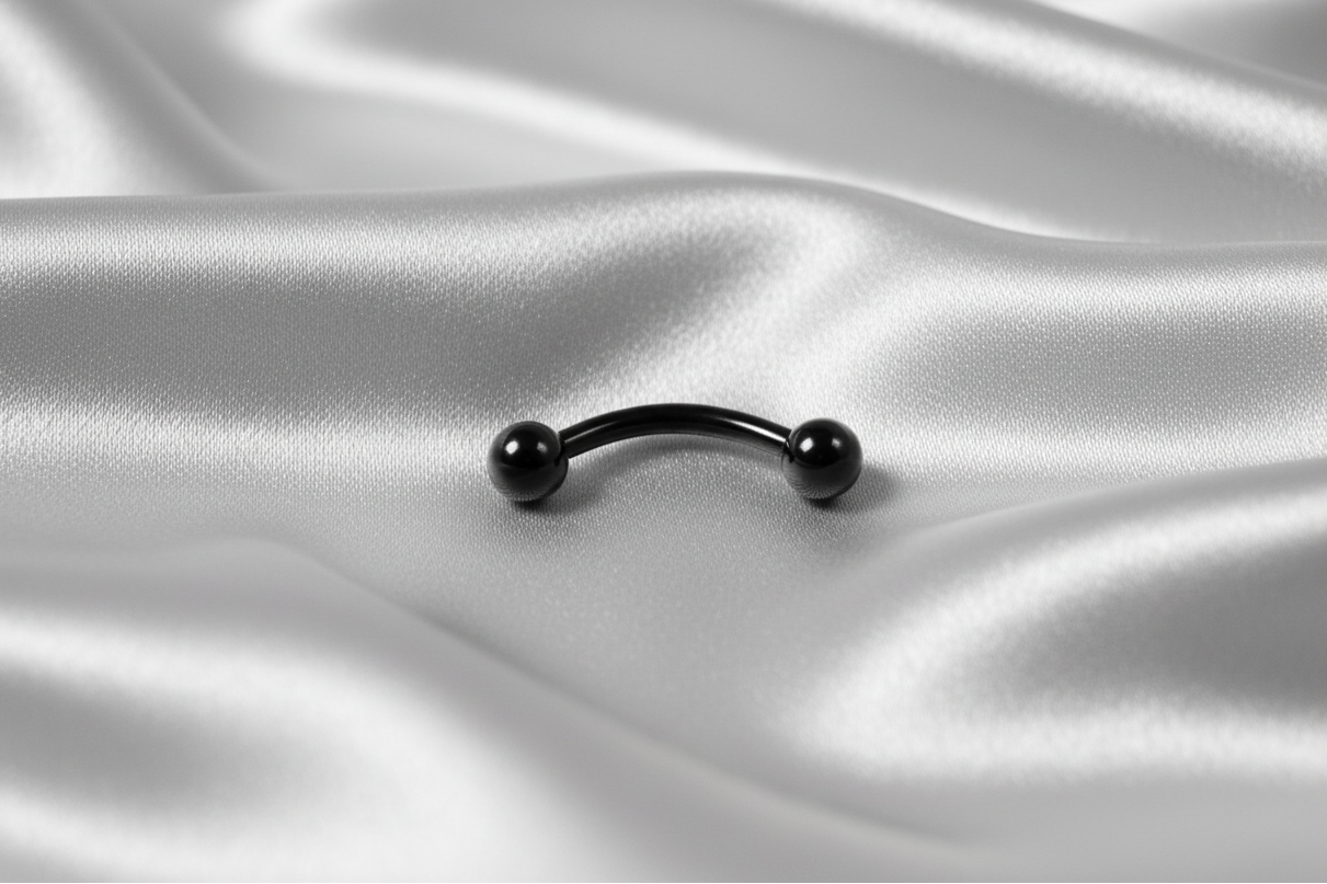 Black Titanium 3mm Ball Eyebrow Ring in black titanium.