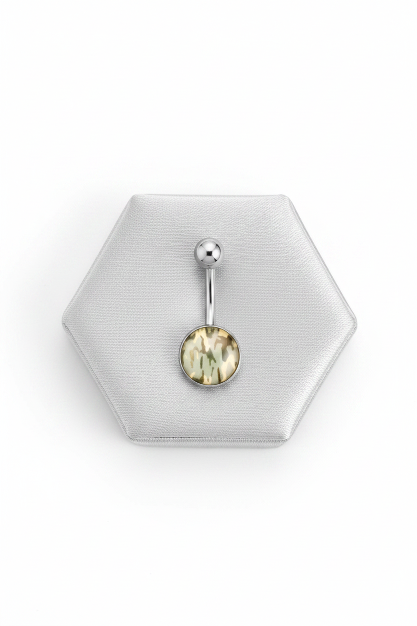 Grey Camouflage Belly Button Ring in 316l stainless steel on a silver jewelry display.