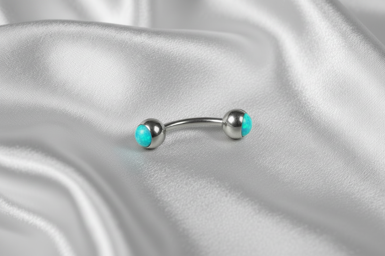 Blue Opal Steel Eyebrow Ring in 316l stainless steel.