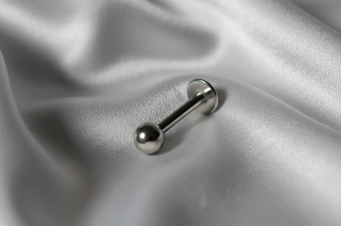 Polished Steel Ball Labret Lip Ring in 316l stainless steel.