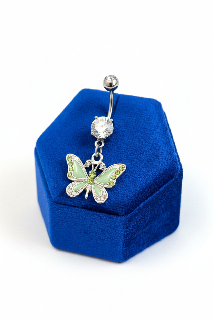 Green Enamel Butterfly Belly Button Ring in 316l stainless steel on a blue velvet jewelry display.