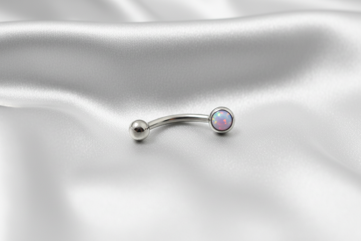 Purple Opal Flat Head Top Eyebrow Ring in 316l stainless steel.