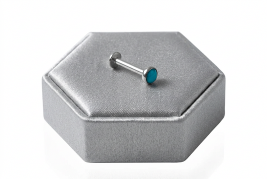Aqua Opal Crystal Labret Lip Ring in 316l stainless steel on a silver silk jewelry display.