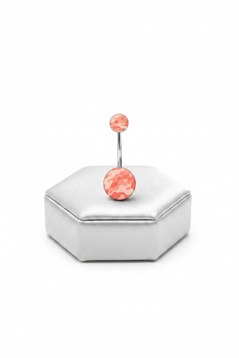 Pink Camouflage Acrylic Belly Button Ring in 316l stainless steel on a silver jewelry display upright angle.