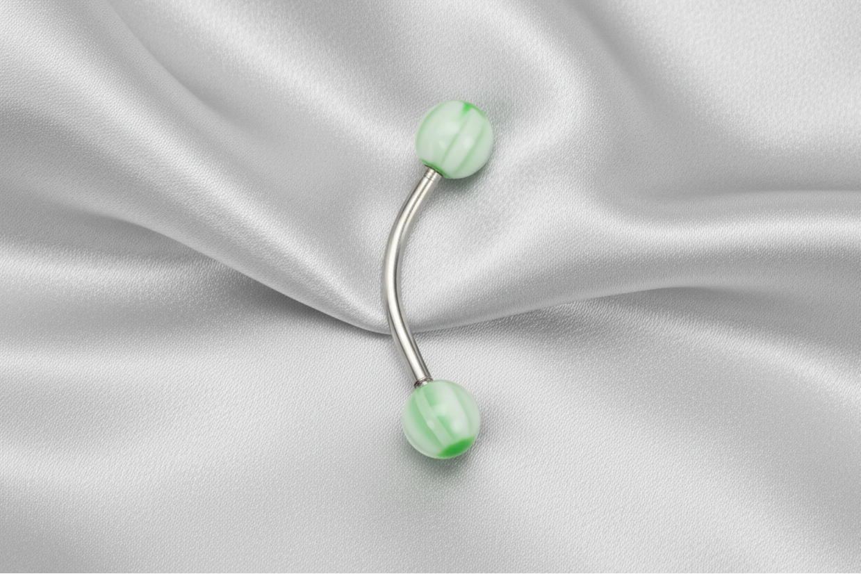 Green and White Acrylic Eyebrow Ring in 316l stainless steel.