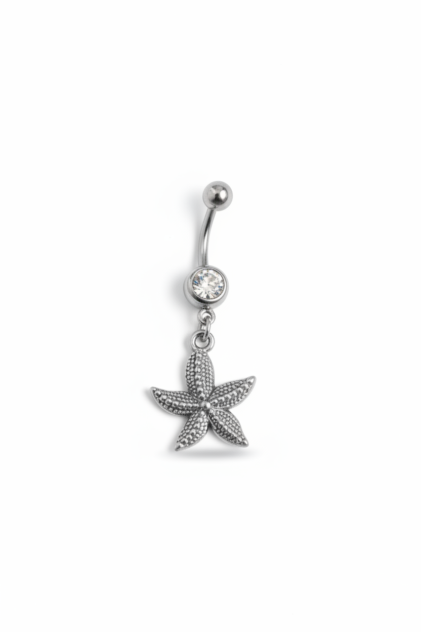 Clear Crystal Star Fish Belly Button Ring in 316l stainless steel close up detail.