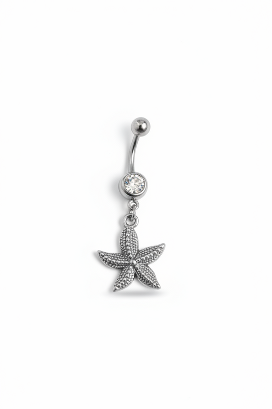 Clear Crystal Star Fish Belly Button Ring in 316l stainless steel close up detail.