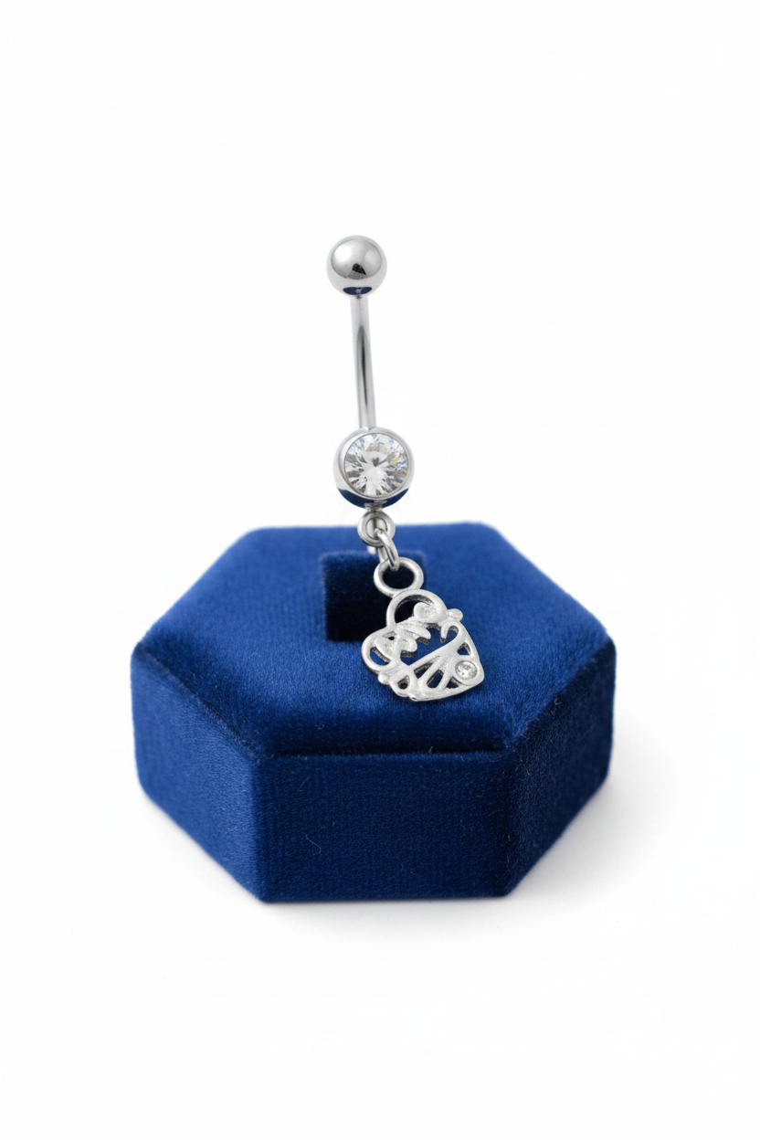 Clear Crystal "Love" Heart Belly Button Ring in 316l stainless steel on a blue velvet jewelry display.