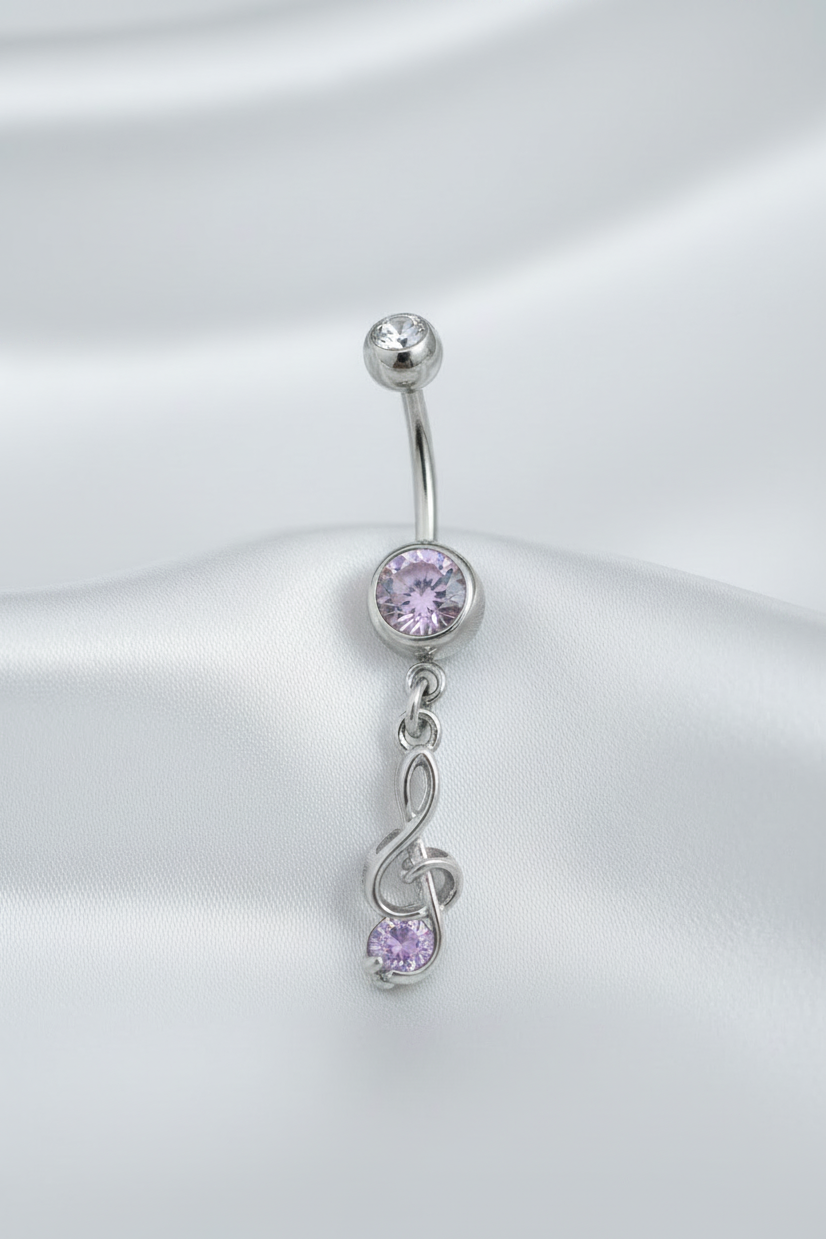 Purple Crystal Treble Clef Belly Button Ring in 316l stainless steel.