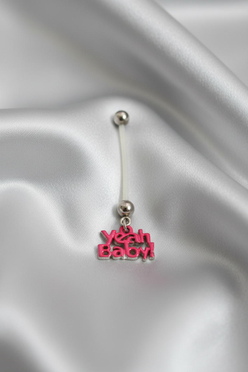 Pink "Yeah Baby" Acrylic Pregnancy Belly Button Ring in 316l stainless steel.