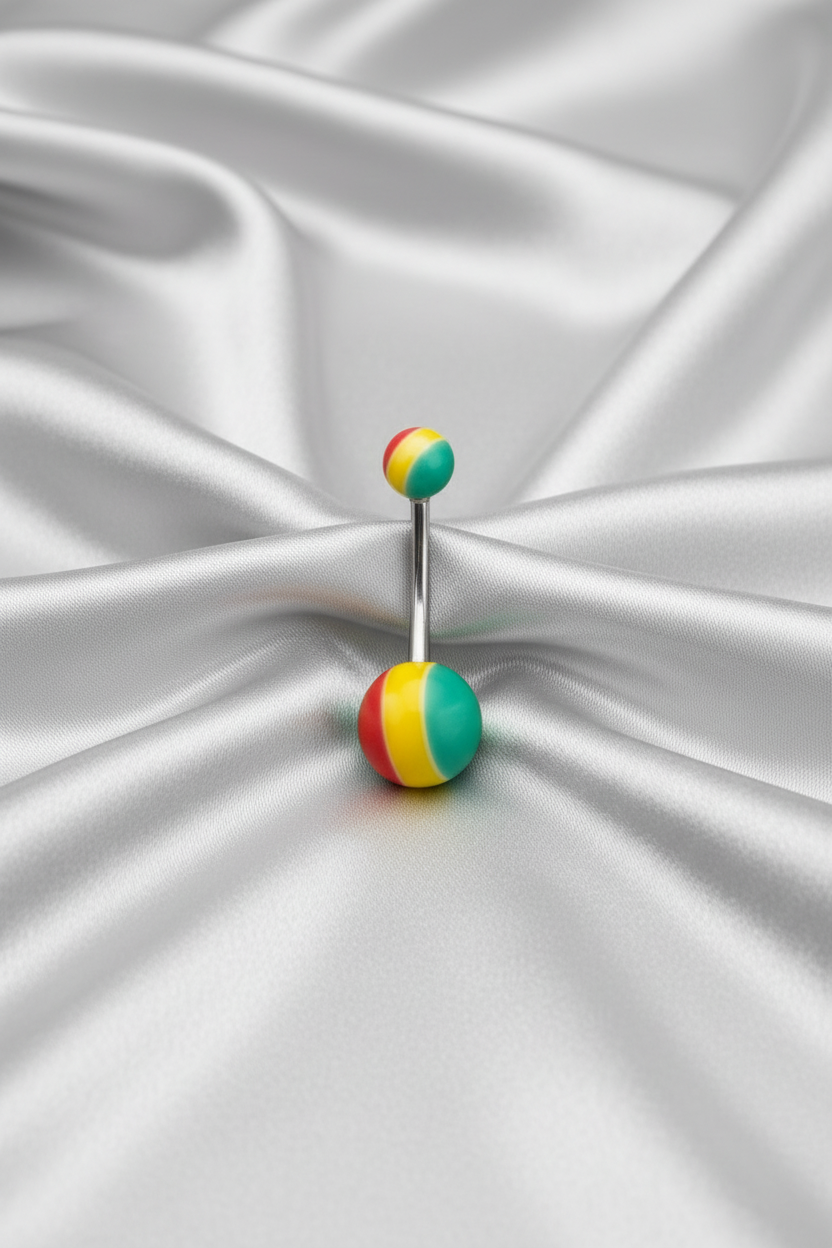 Rastafarian Striped Acrylic Belly Button Ring in 316l stainless steel on silver silk fabric.