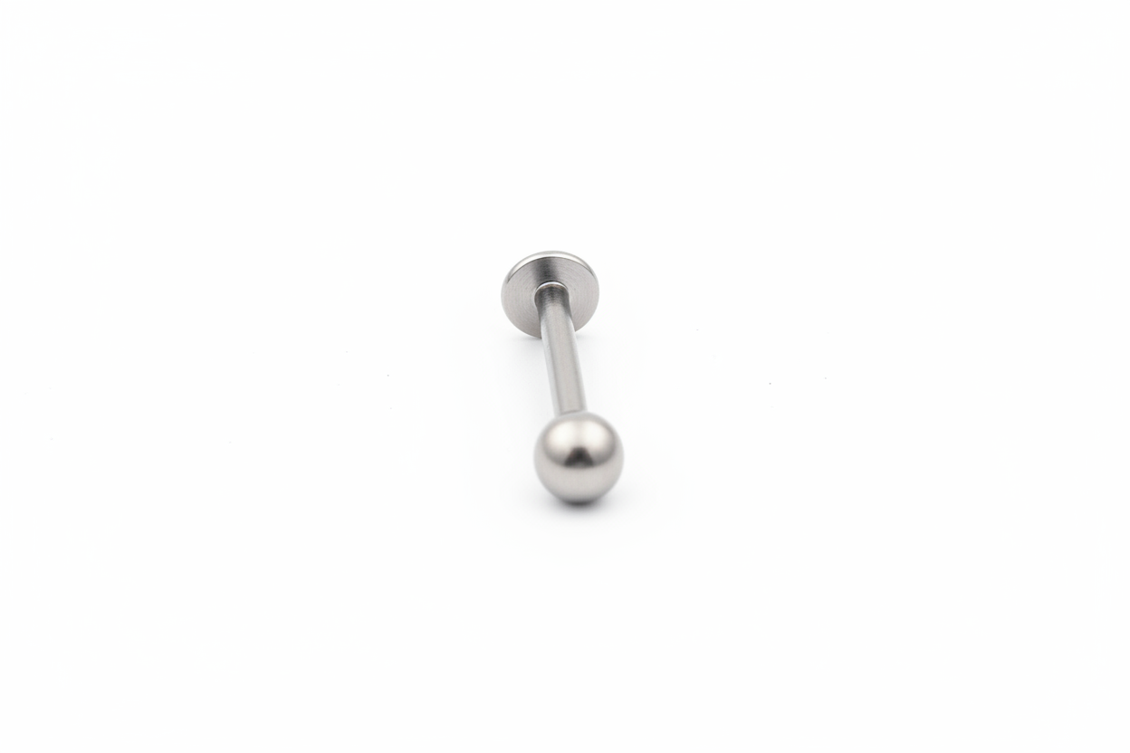 Steel Ball Labret Lip Ring in 316l stainless steel close up detail.
