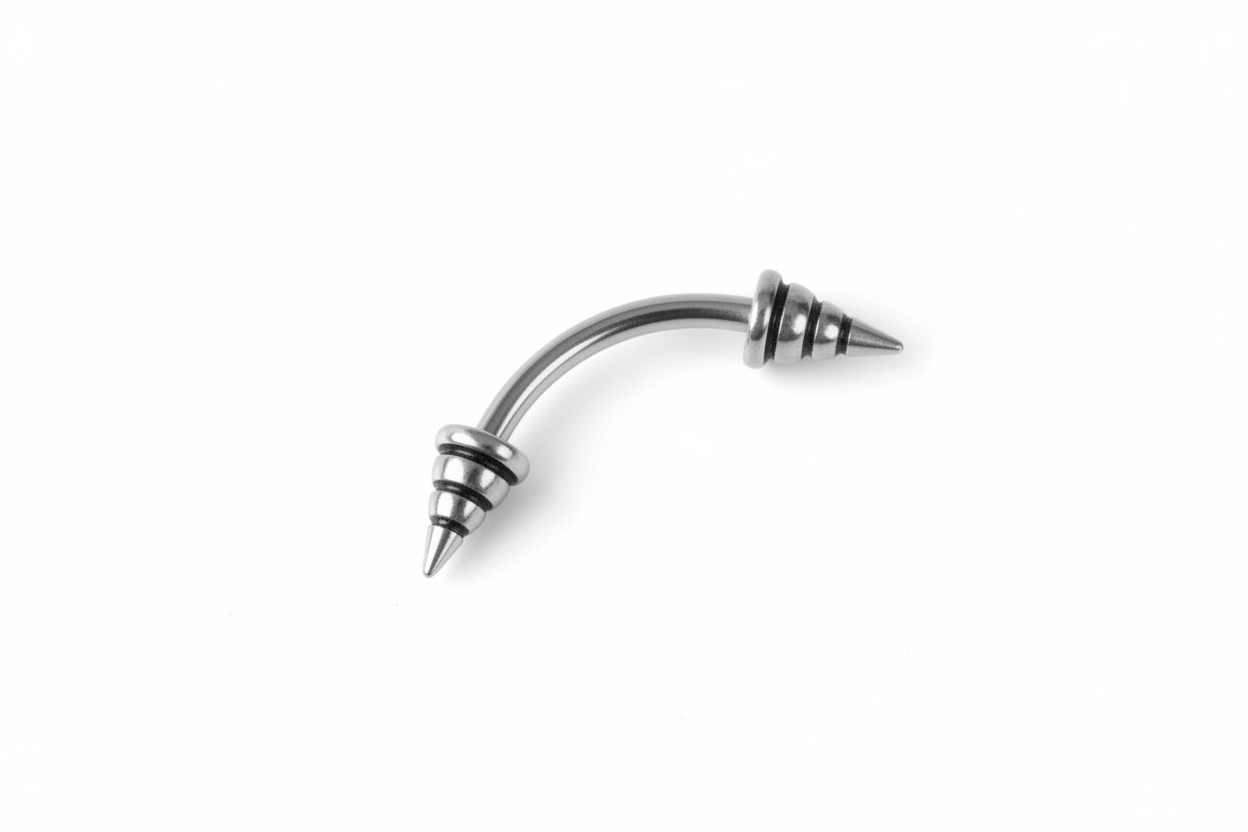 Black Striped Steel Spike Eyebrow Ring in 316l stainless steel close up detail.