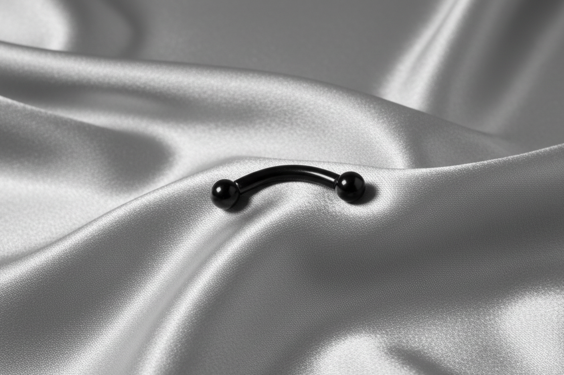 Black Titanium 2mm Ball Eyebrow Ring in black titanium.