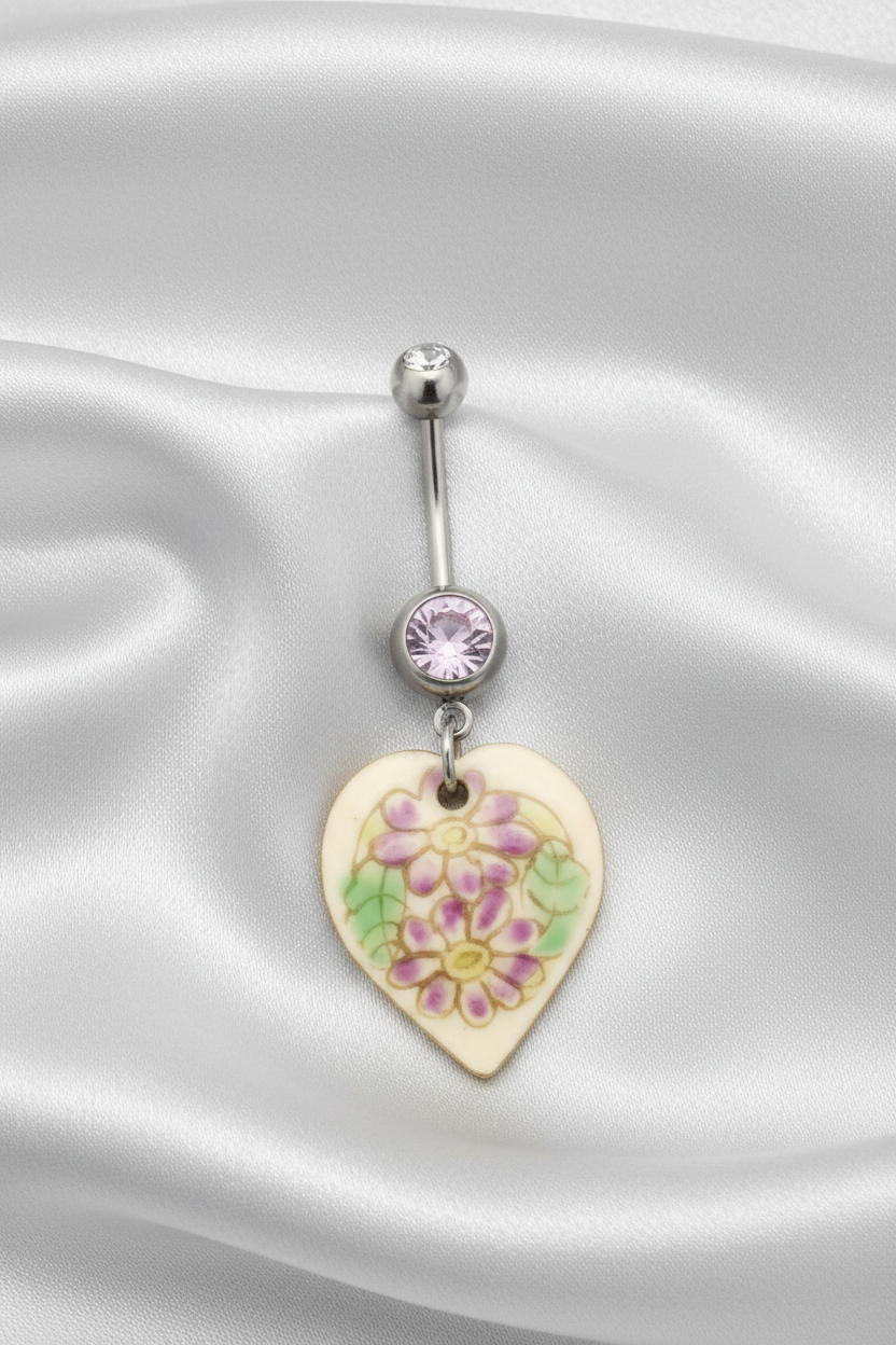 Purple Crystal Floral Heart Belly Button Ring in 316l stainless steel.