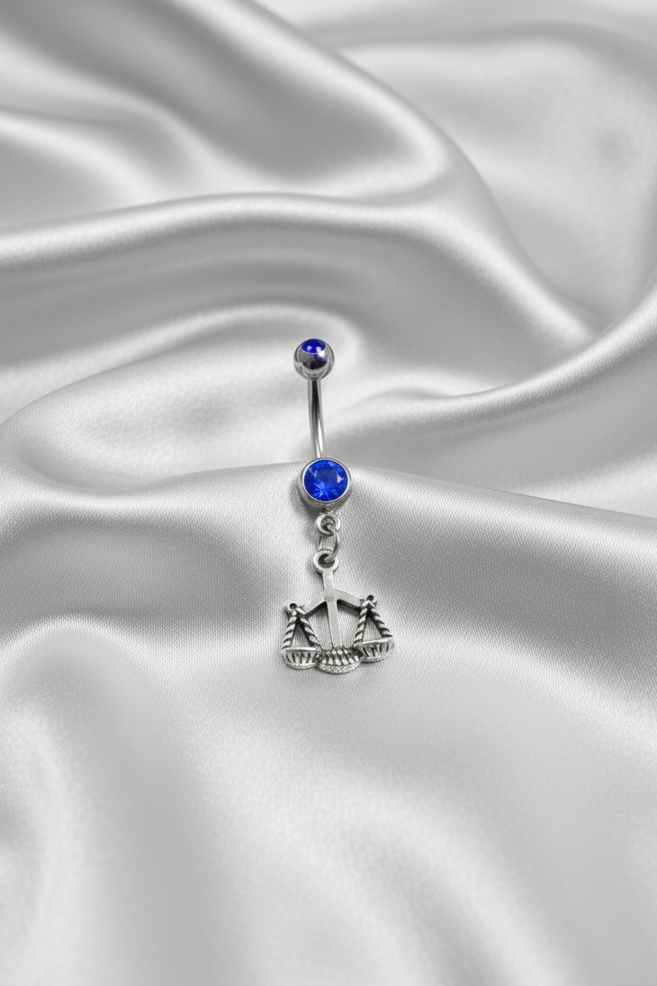 Blue Crystal Libra Belly Button Ring in 316l stainless steel.