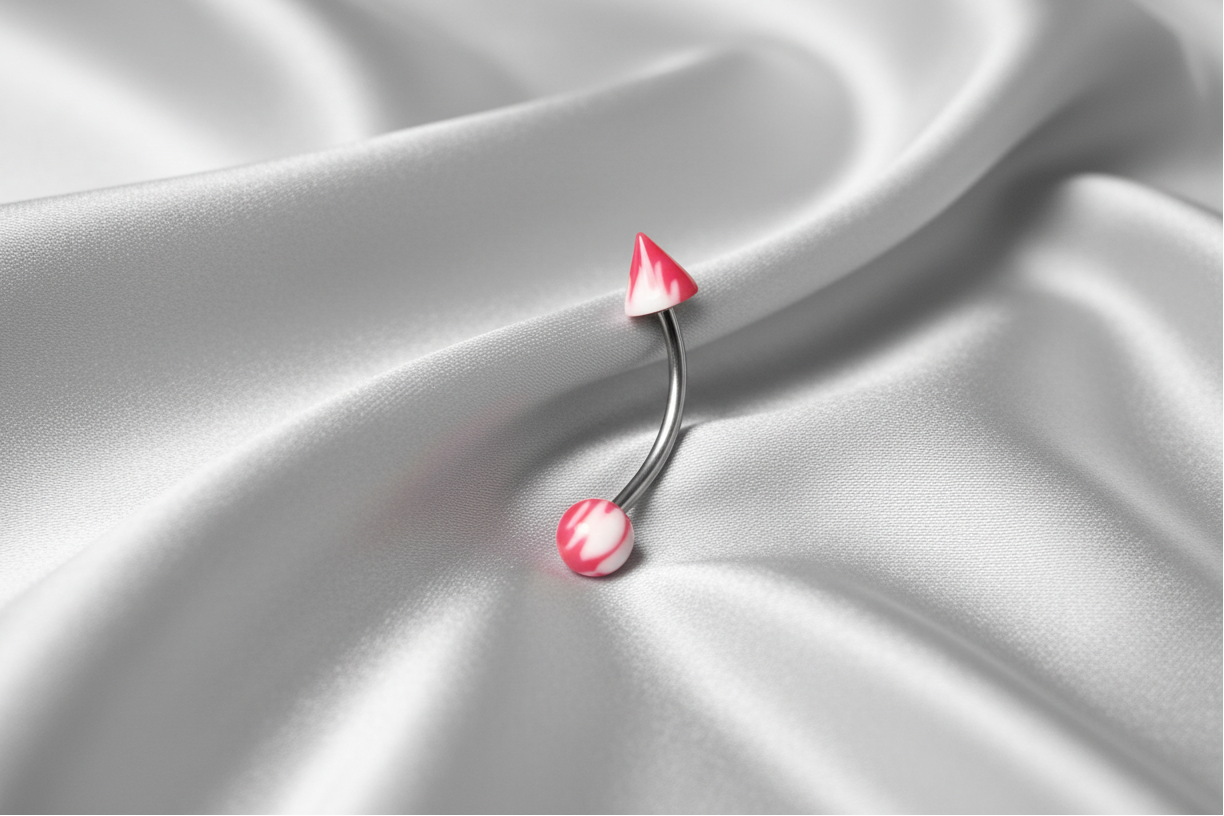 Red and White Acrylic Eyebrow Ring in 316l stainless steel.