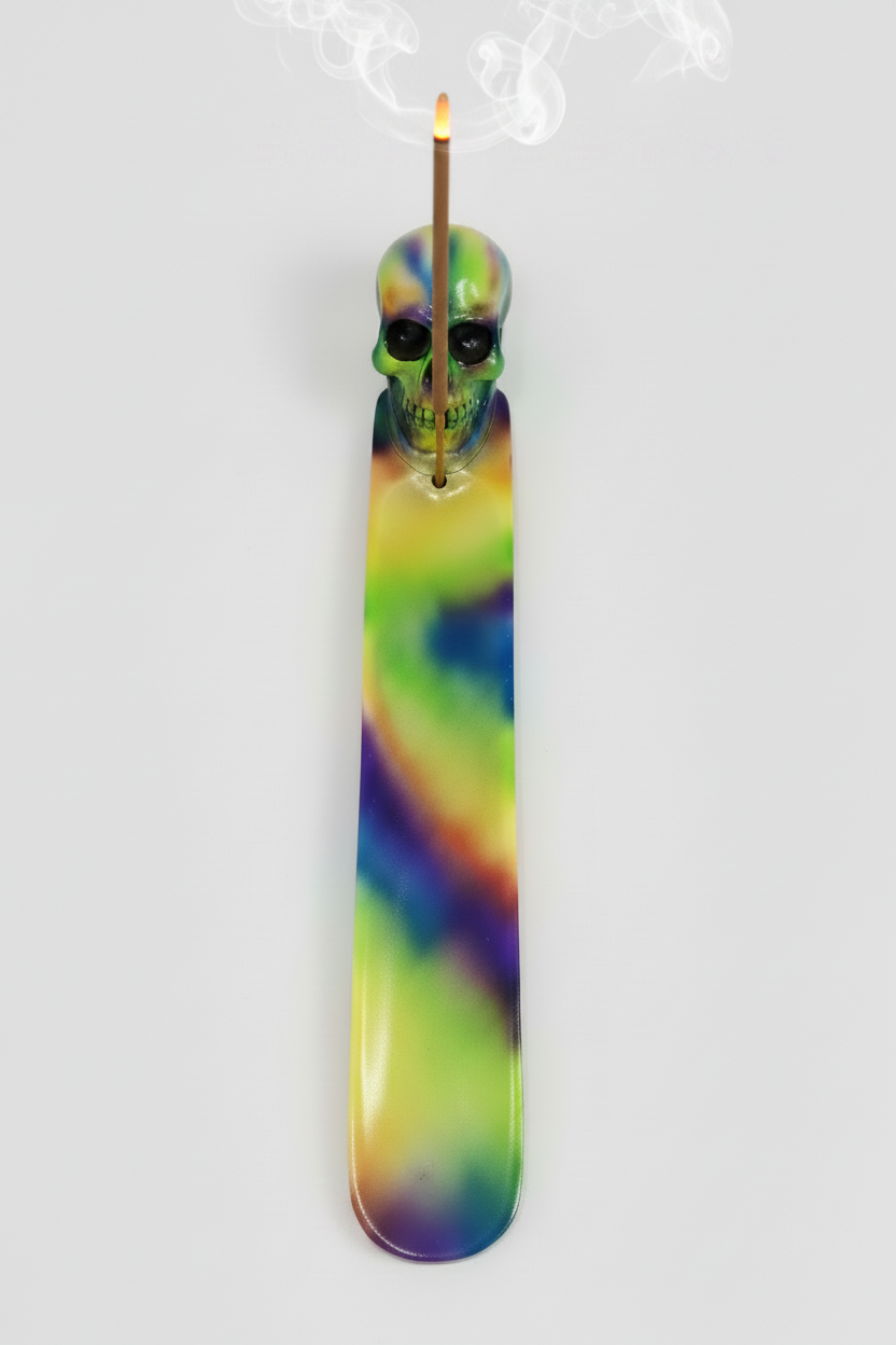 Rainbow Skull Resin Incense Holder - Free Incense on a white background with incense burning and smoke rising.