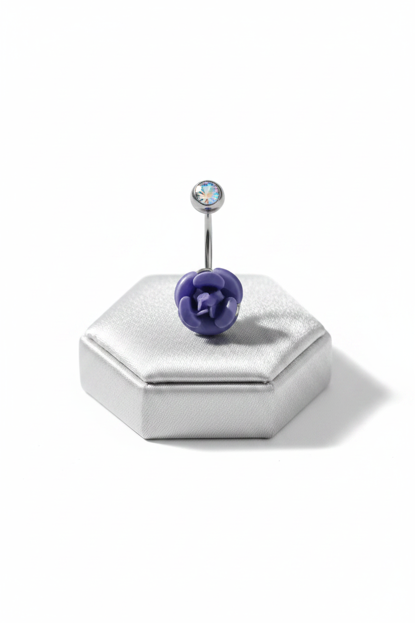 Blue Rose Belly Button Ring in 316l stainless steel on a silver jewelry display upright position.