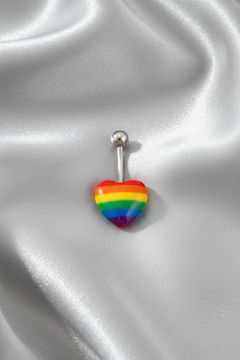 Rainbow Heart Acrylic Belly Button Ring in 316l stainless steel on silver silk fabric.