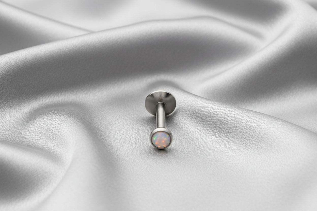 Internally Threaded  Pastel Pink Opal Crystal Labret Lip Ring in 316l stainless steel.