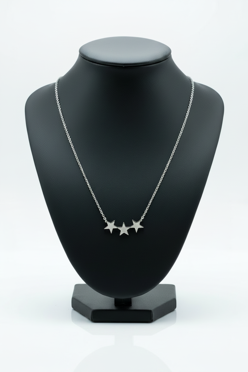 3 Stars Steel Chain Necklace in 316l stainless steel on a black bust with a white background.