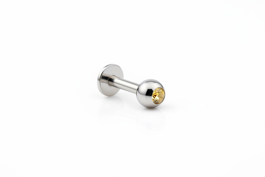 Yellow Crystal Labret Lip Ring - 316L Stainless Steel close up detail.