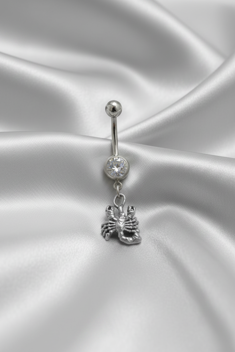 Clear Crystal Scorpio Belly Button Ring in 316l stainless steel.