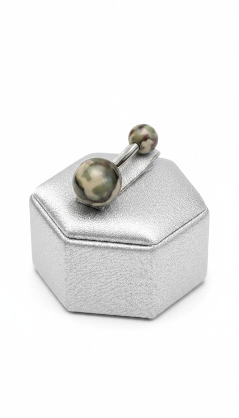 Green Camouflage Acrylic Belly Button Ring in 316l stainless steel on a silver jewelry display backside view.